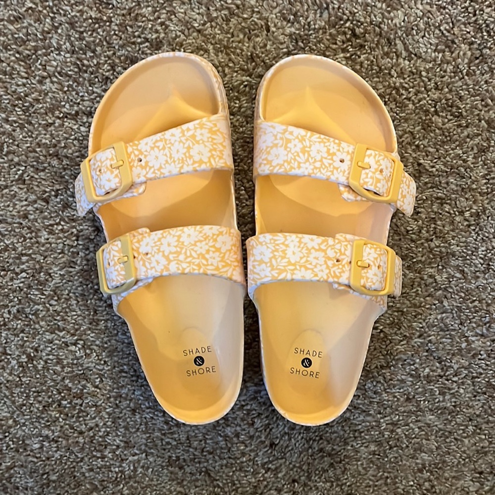 orange floral sandals.